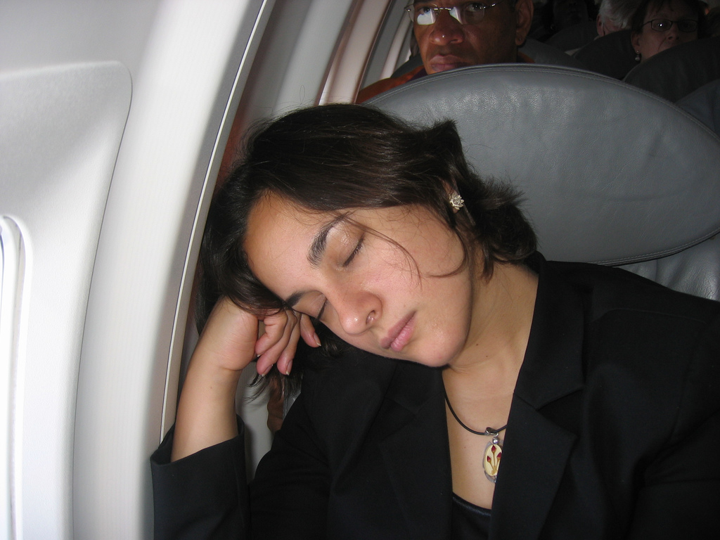 sleeping on airplane photo