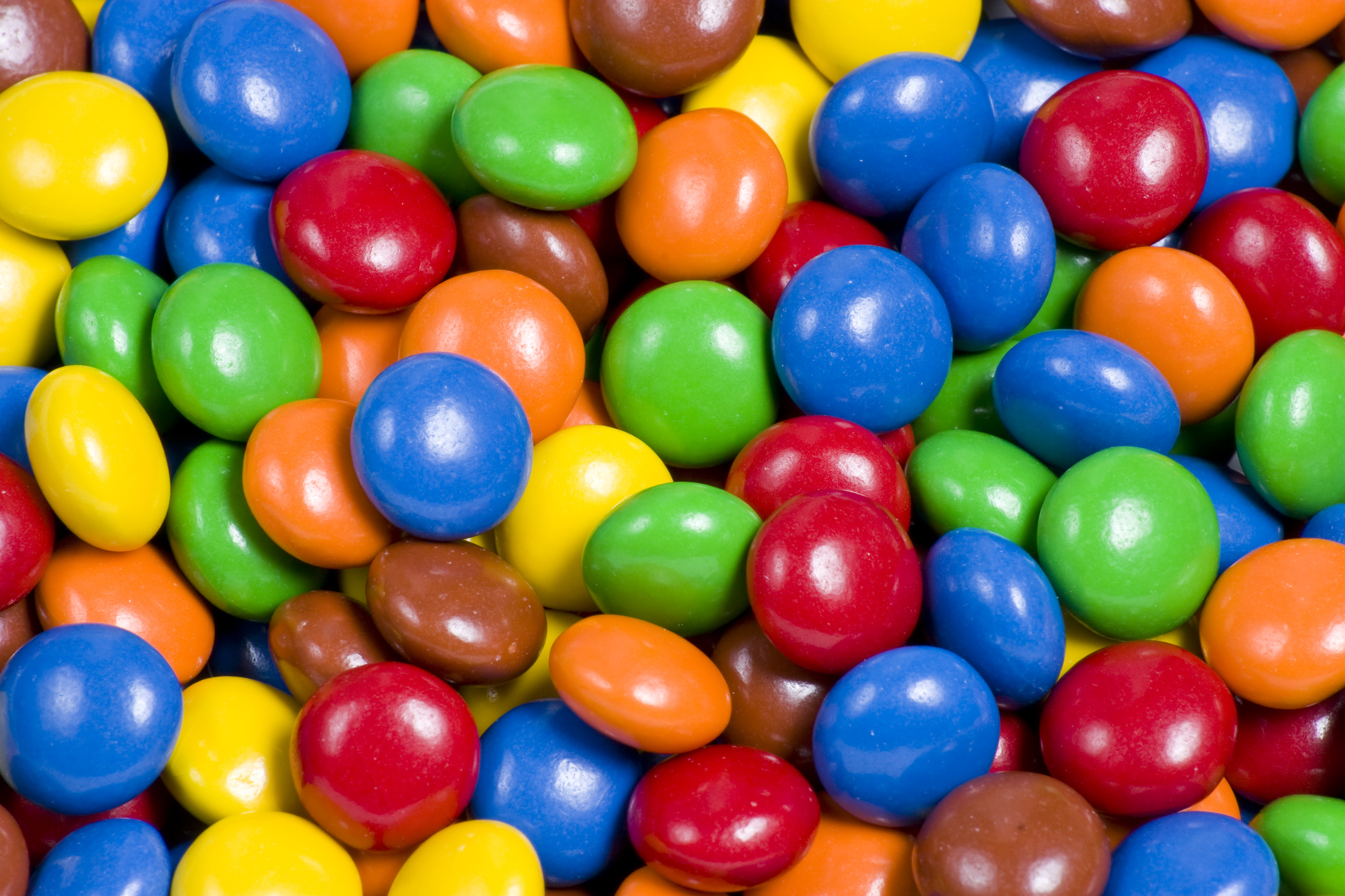 Assortment of Colorful Chocolate Candy Usable as Background or Pattern