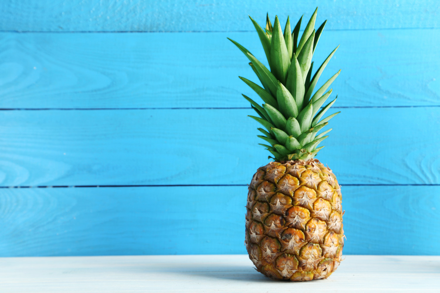Pineapple on blue background