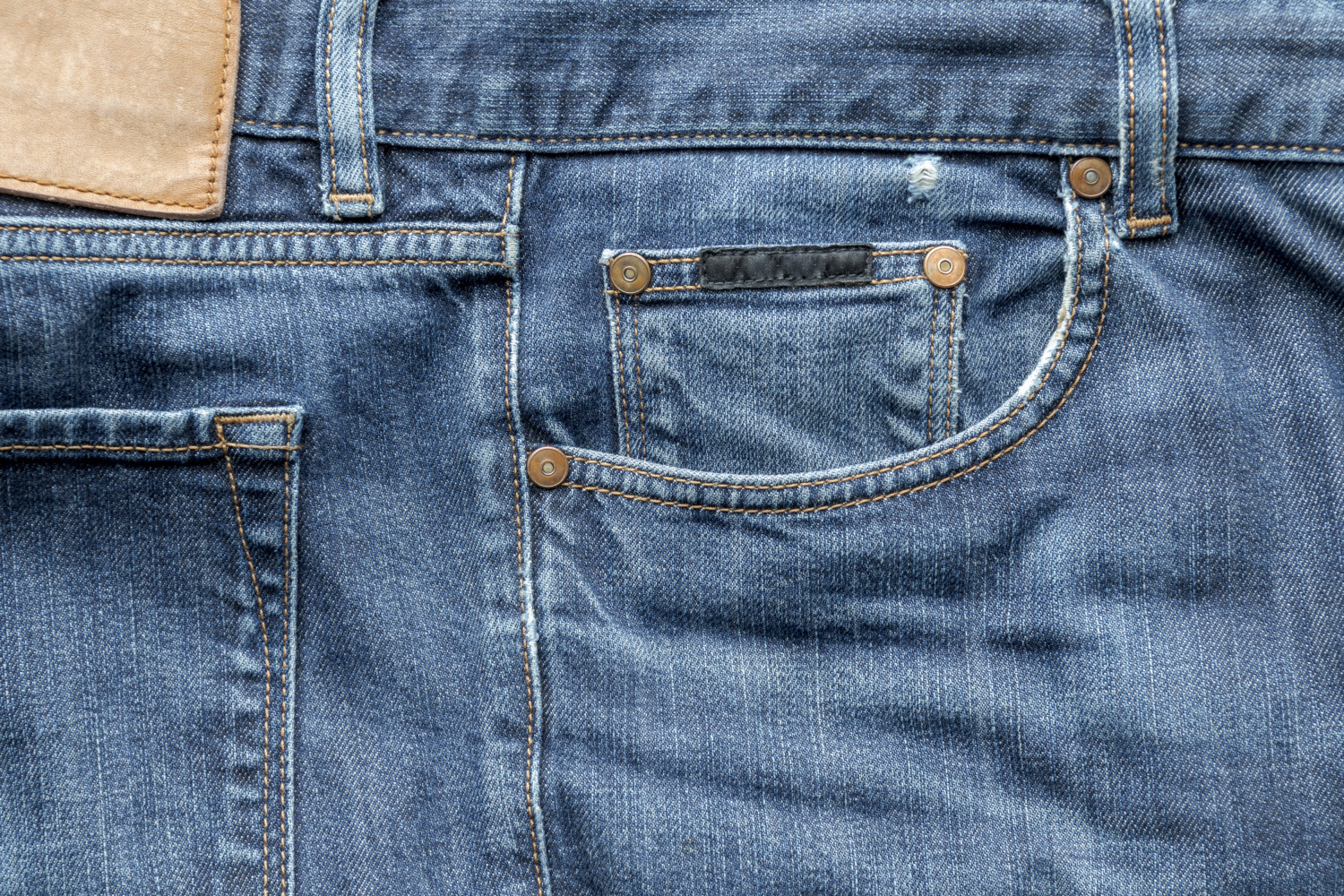 Small pocket on blue jeans