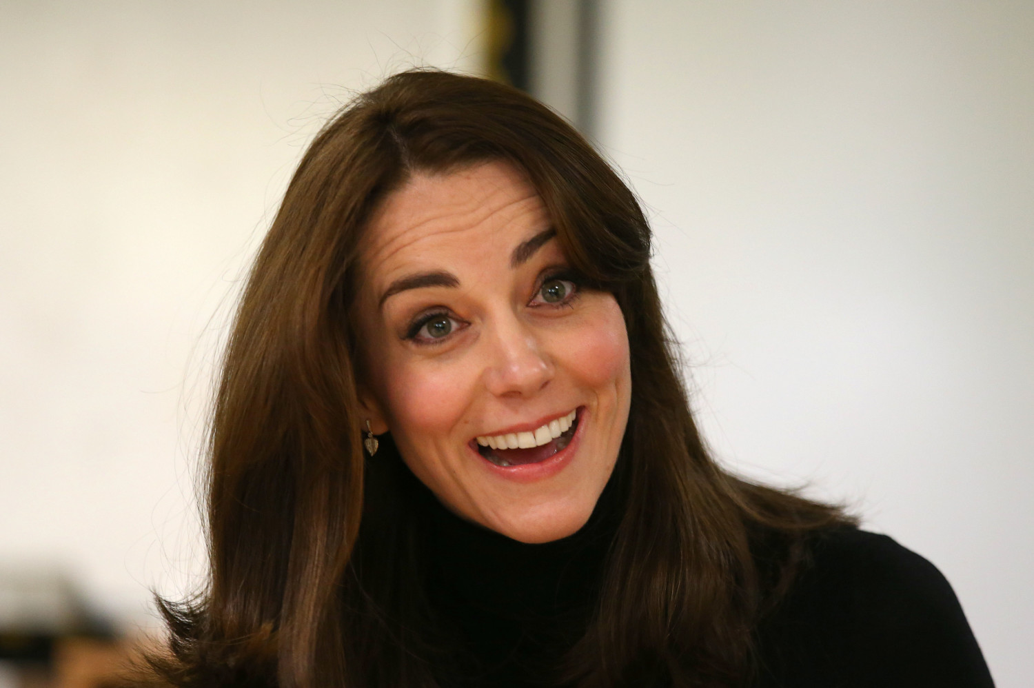 Britain's Kate, the Duchess of Cambridge, smiles as she joins headteachers from schools in Edinburgh during a visit to the Place2Be charity at Catherine's Primary School in Edinburgh, on Wednesday, Feb. 24, 2016. (Andrew Millingan/ Pool photo via AP)