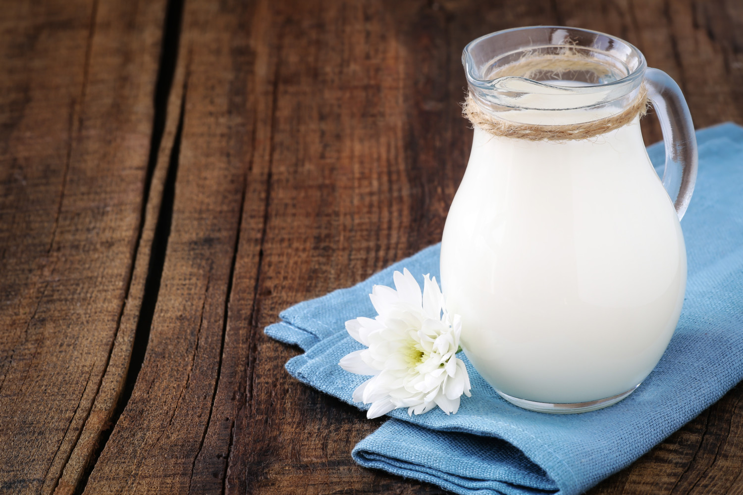 Heavy cream or milk in glass jug