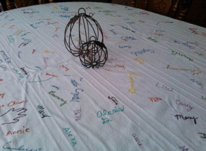Signatures on tablecloth for Thanksgiving tradition