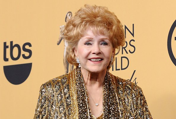 LOS ANGELES, CA - JANUARY 25: Actress Debbie Reynolds poses in the press room at the 21st annual Screen Actors Guild Awards at The Shrine Auditorium on January 25, 2015 in Los Angeles, California. (Photo by Jason LaVeris/FilmMagic)