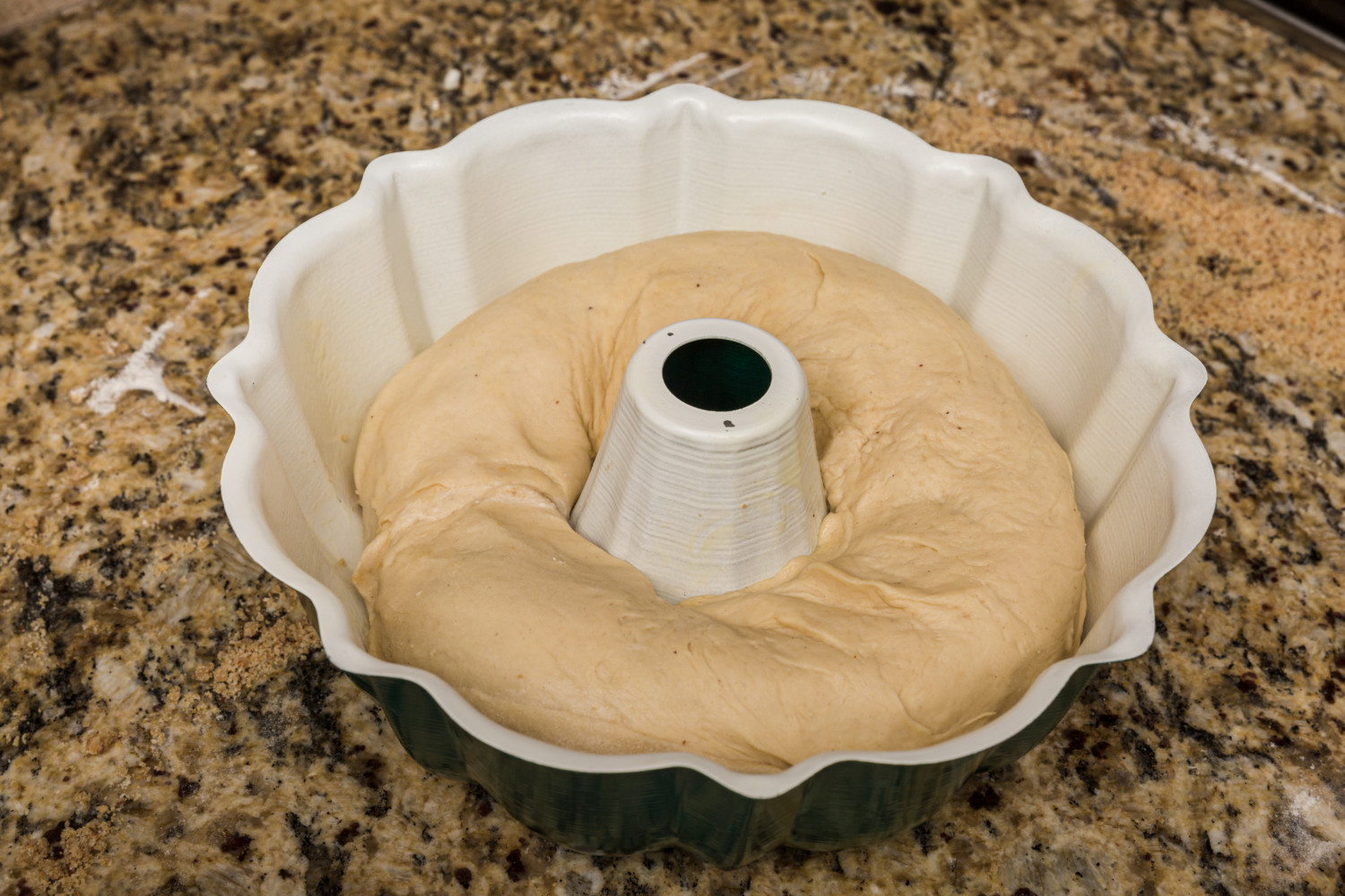 bread dough in bundt pan