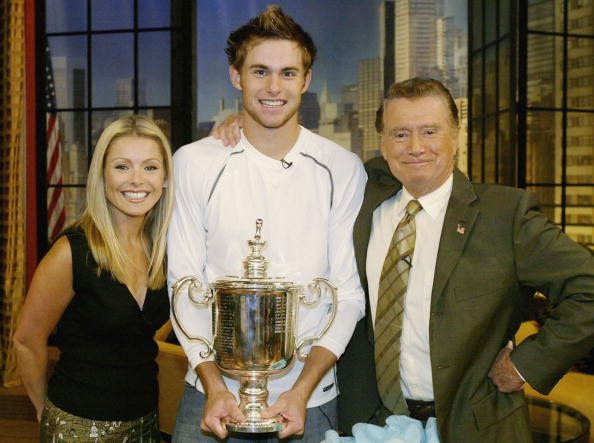 NEW YORK - SEPTEMBER 8: US Open singles champion Andy Roddick meets Regis Philben and Kelli Rippa while making an appearance on the Regis & Kelli Show September 8, 2003 in New York City. (Photo by Matthew Stockman/Getty Images)