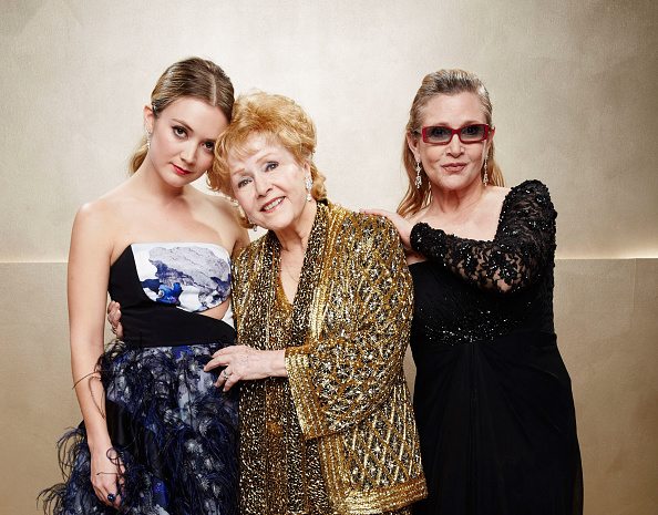 LOS ANGELES, CA - JANUARY 25: (Exclusive Coverage) Billie Lourd, Carrie Fisher and Debbie Reynolds pose during TNT's 21st Annual Screen Actors Guild Awards at The Shrine Auditorium on January 25, 2015 in Los Angeles, California. 25184_016 (Photo by Kevin Mazur/WireImage)