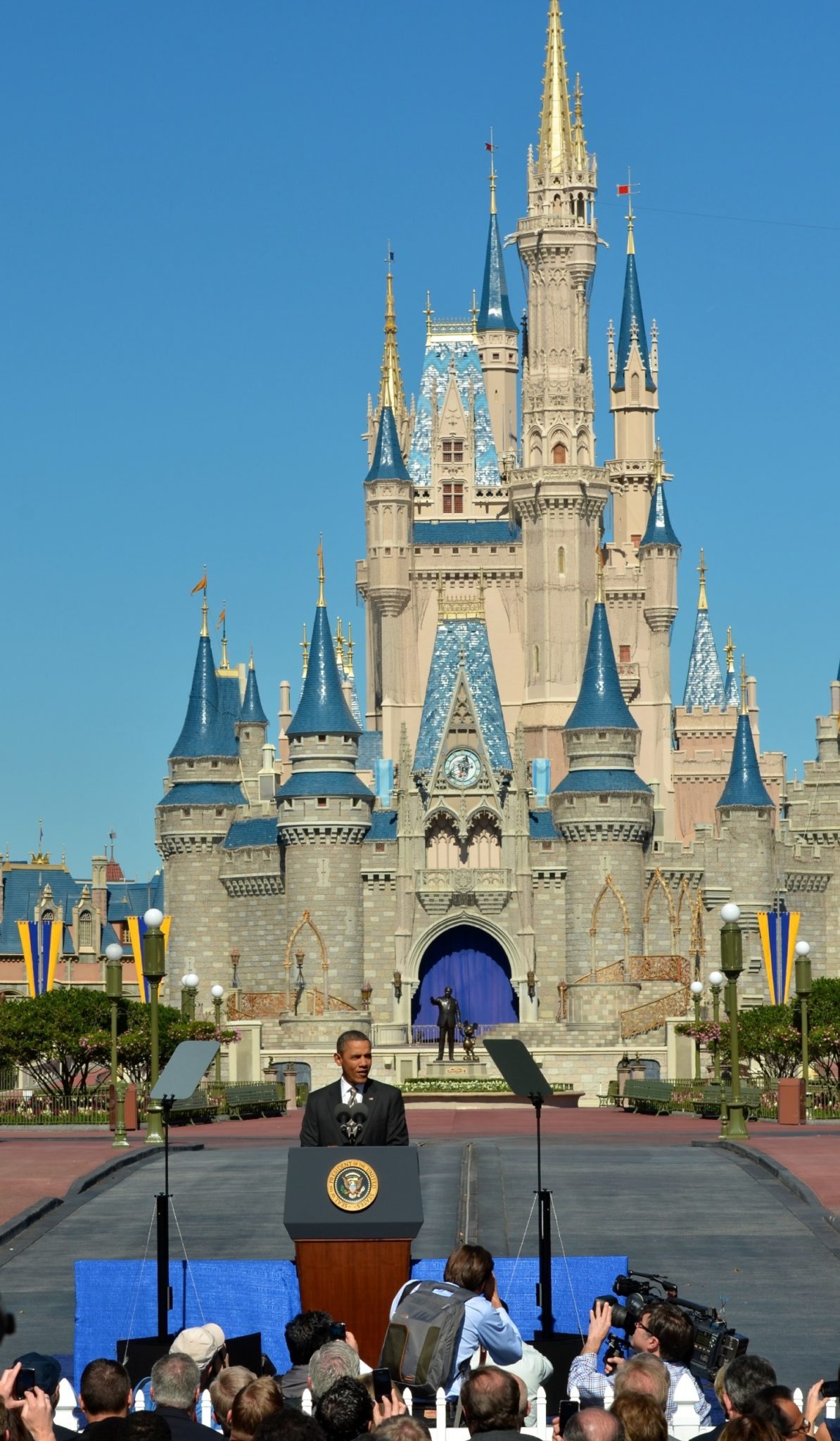 LAKE BUENA VISTA, FL - JANUARY 19: U.S. President Barack Obama speaks to a crowd of supporters at Walt Disney World's Magic Kingdom with Cinderella Castle in the background January 19, 2012 in Lake Buena Vista, Florida. Obama's speech addressed his "We Can't Wait" initiative to create jobs partly through boosting travel and tourism. (Photo by Roberto Gonzalez/Getty Images)