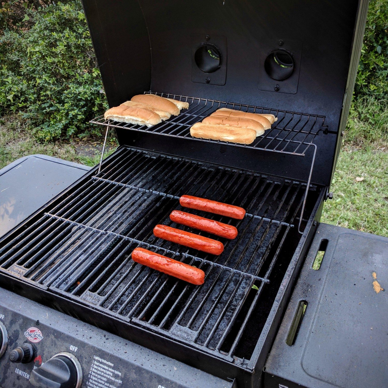 hot dog on grill photo