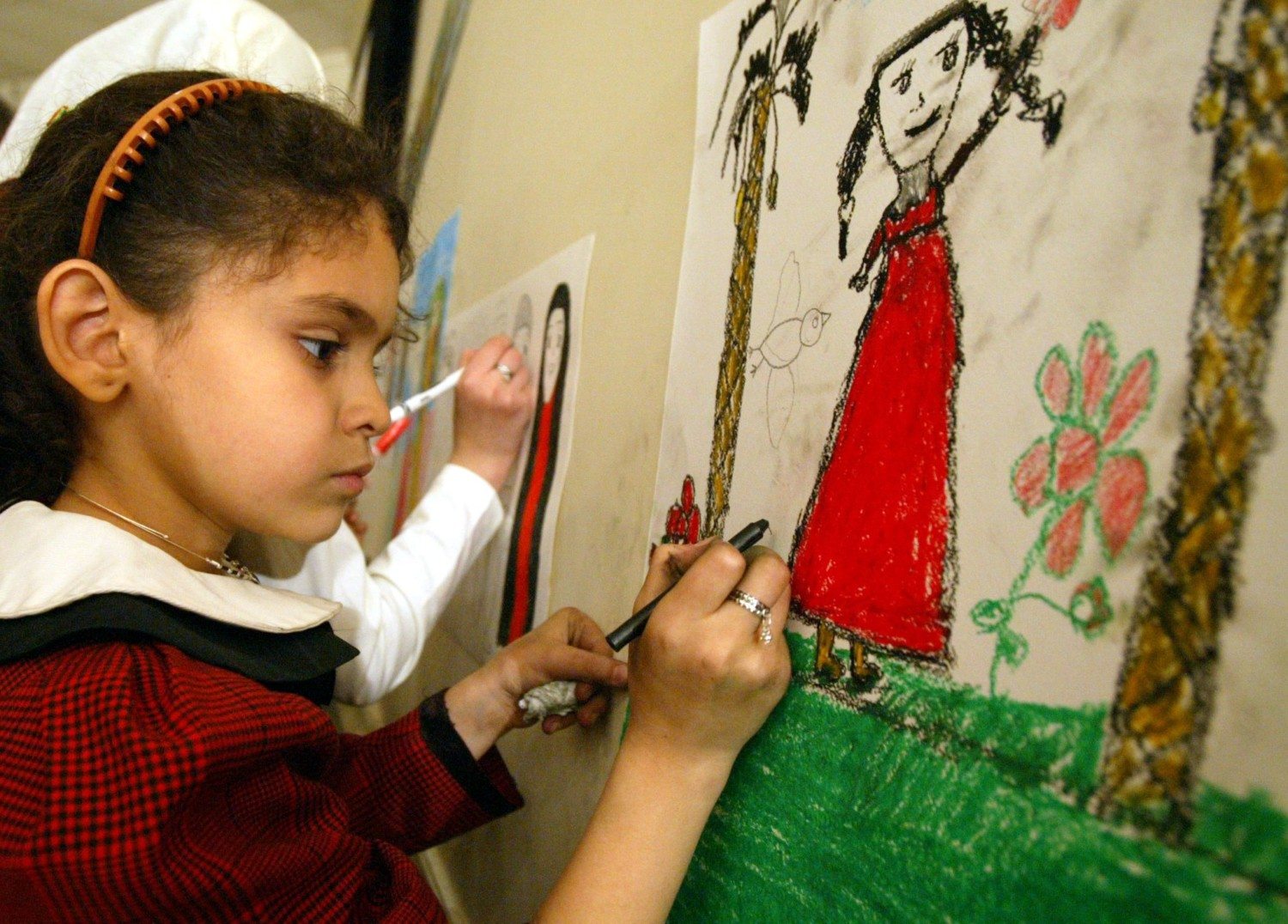 child drawing photo