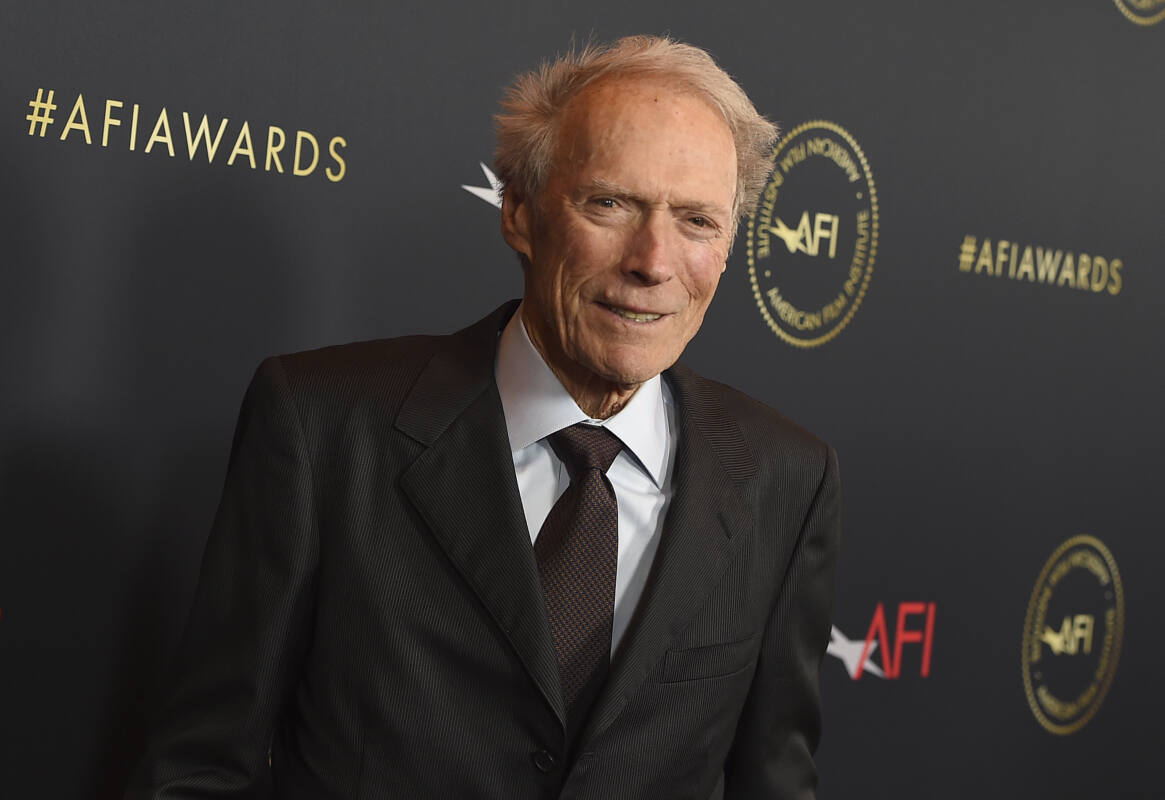 Clint Eastwood smiles on the red carpet