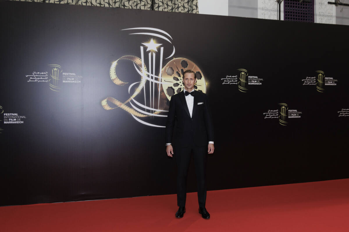 Alexander Skarsgard poses on red carpet