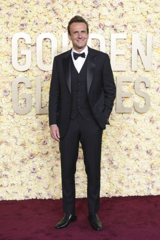 Jason Segel poses on Golden Globes red carpet