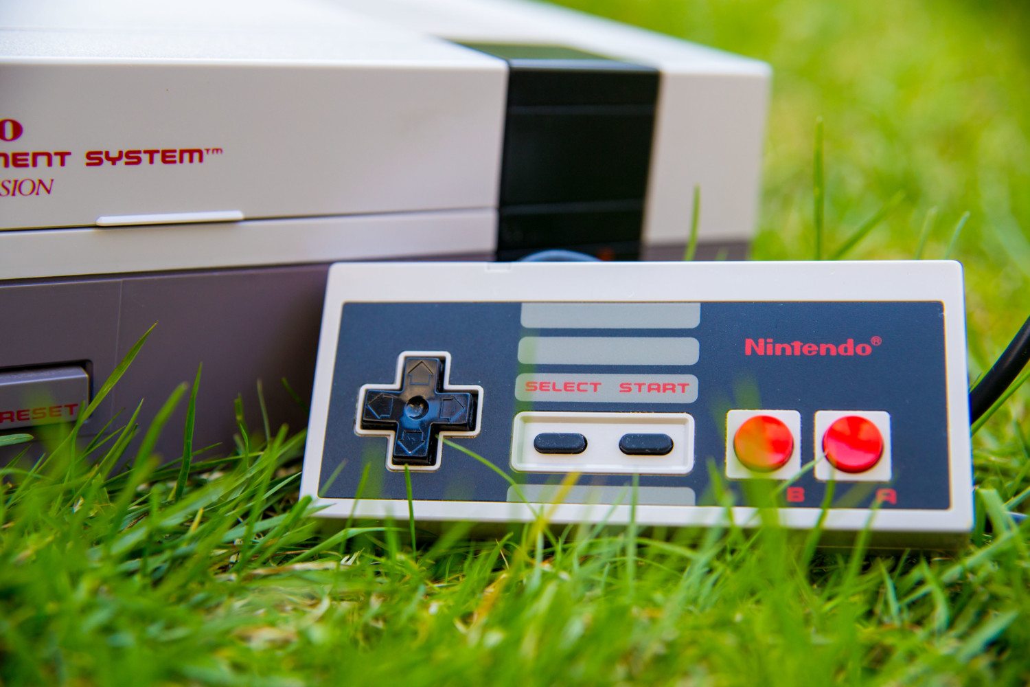 Nintendo NES on green grass