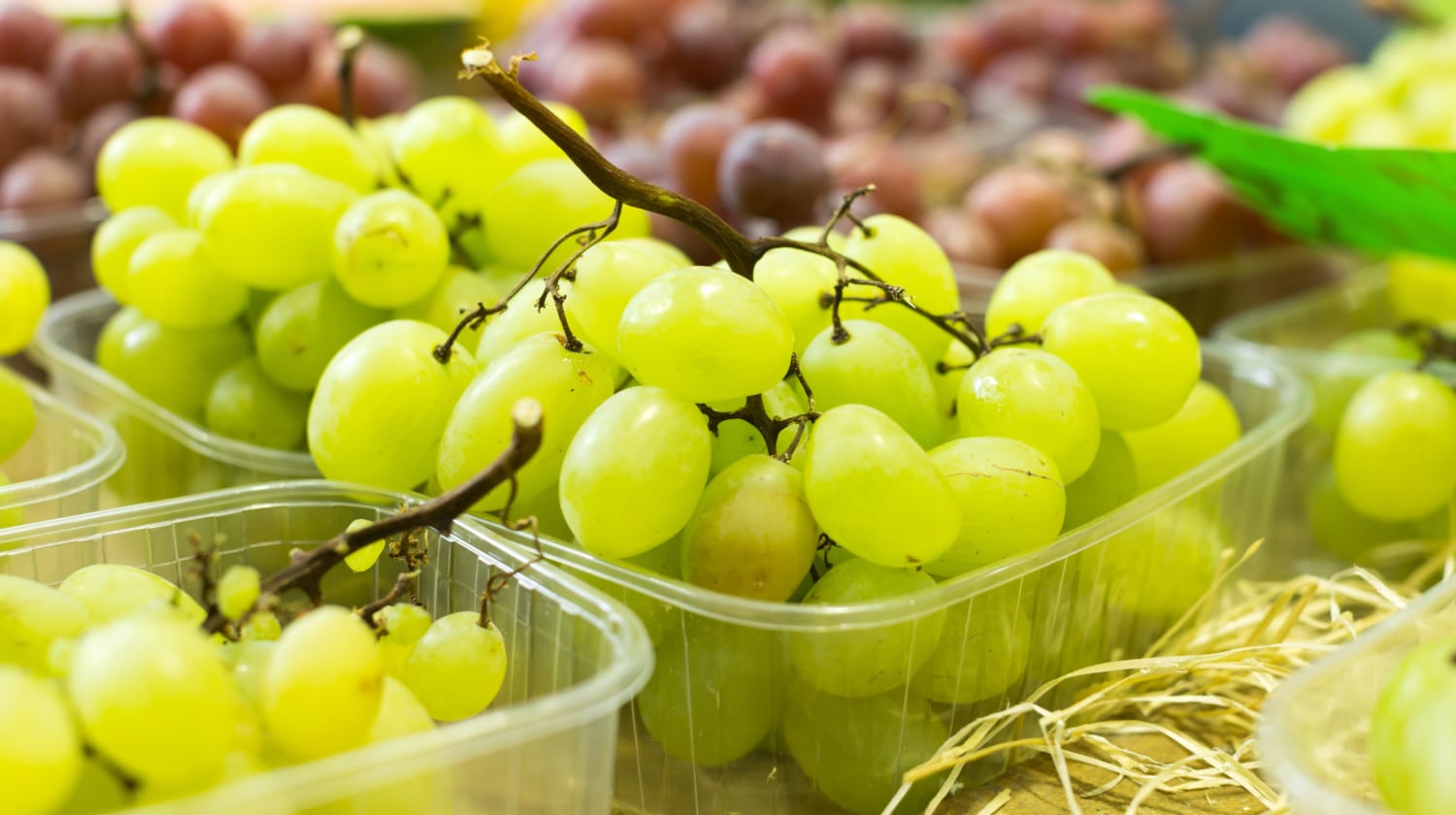 bunch of grapes on the counter market