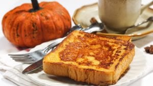 Pumpkin french toast on white plate