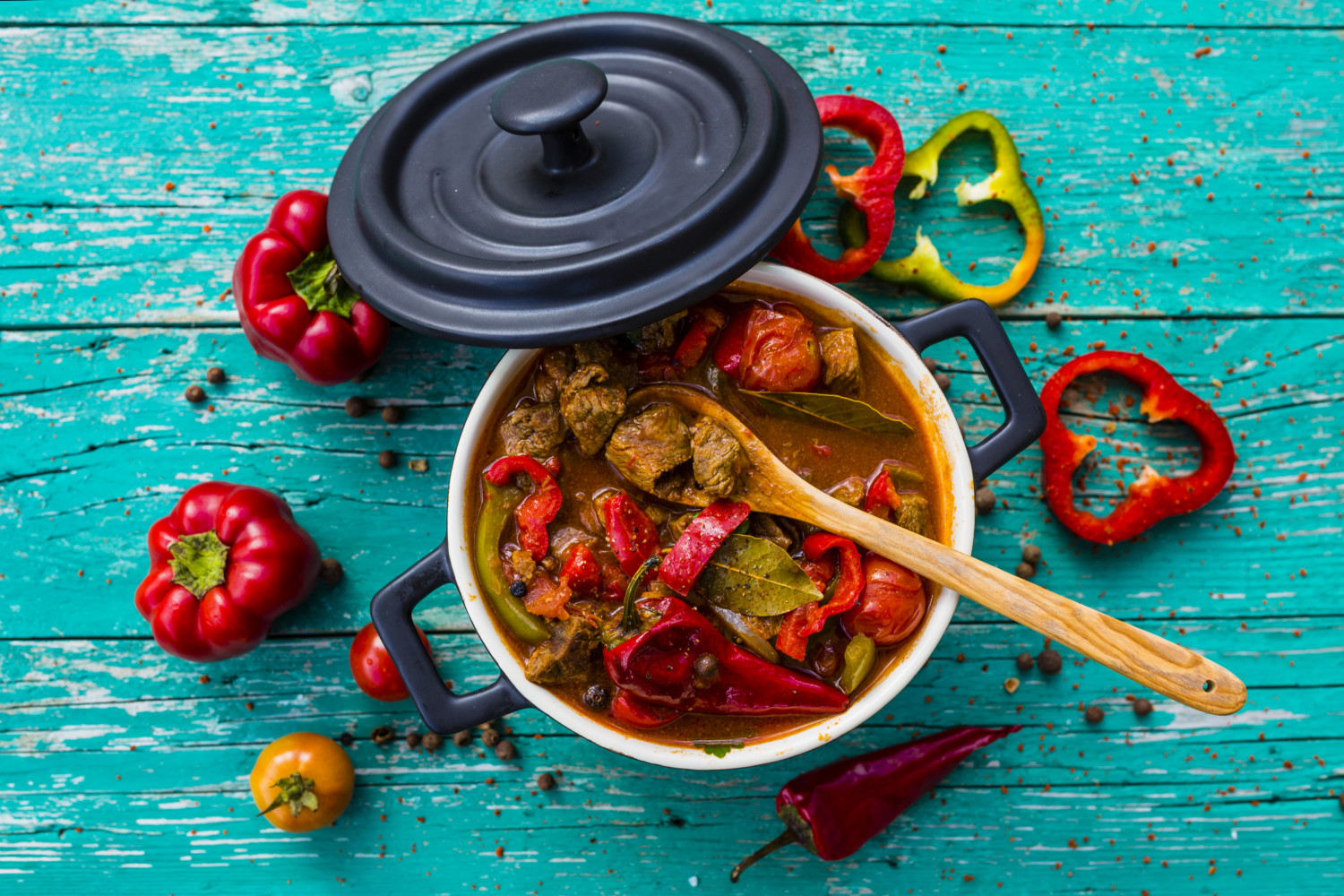 Goulash soup in Dutch oven with beef, peppers