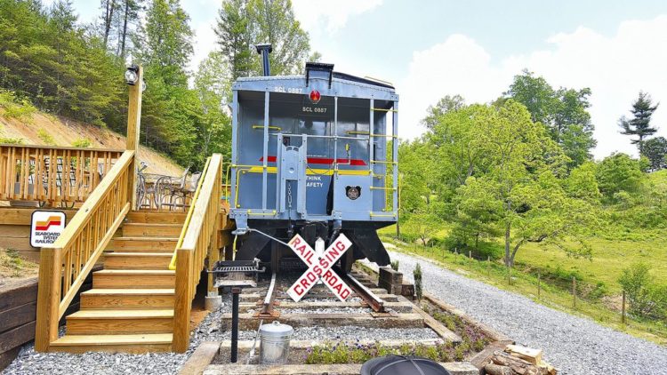 Blue train caboose vacation rental
