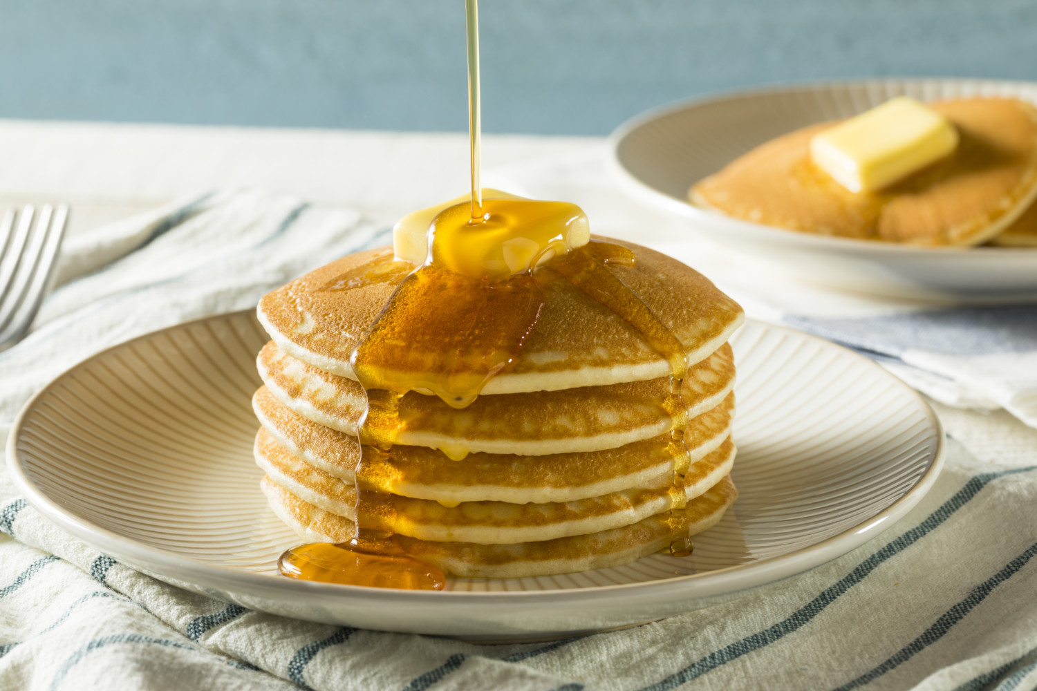 Pancakes with butter and syrup