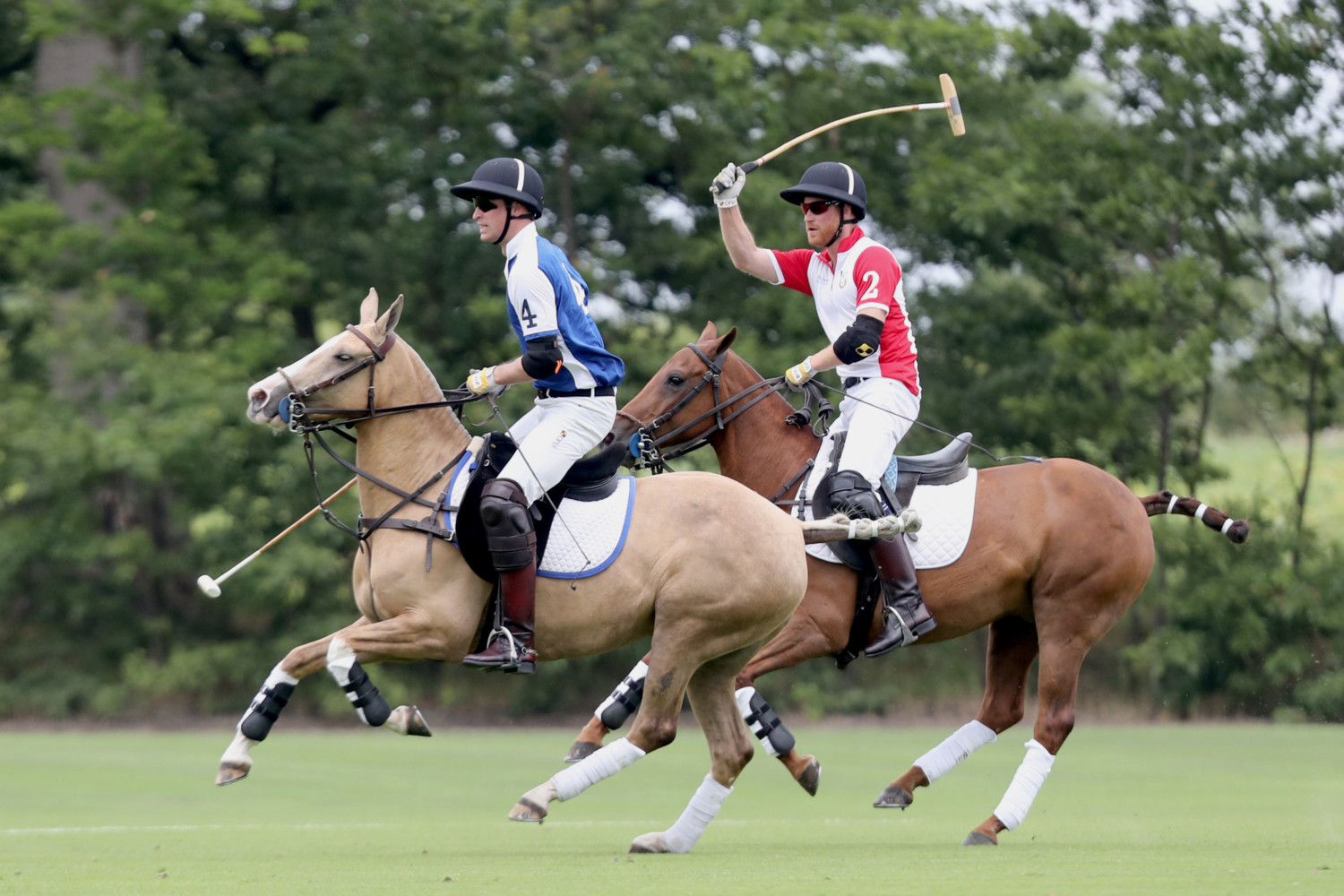 WOKINGHAM, ENGLAND - JULY 10: Prince William, Duke of Cambridge and Prince Harry, Duke of Sussex compete during the King Power Royal Charity Polo Day for the Vichai Srivaddhanaprabha Memorial Trophy at Billingbear Polo Club on July 10, 2019 in Wokingham, England. (Photo by Chris Jackson/Getty Images for The King Power Royal Charity Polo )