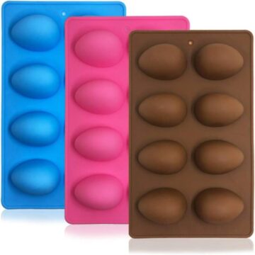 three egg mold trays