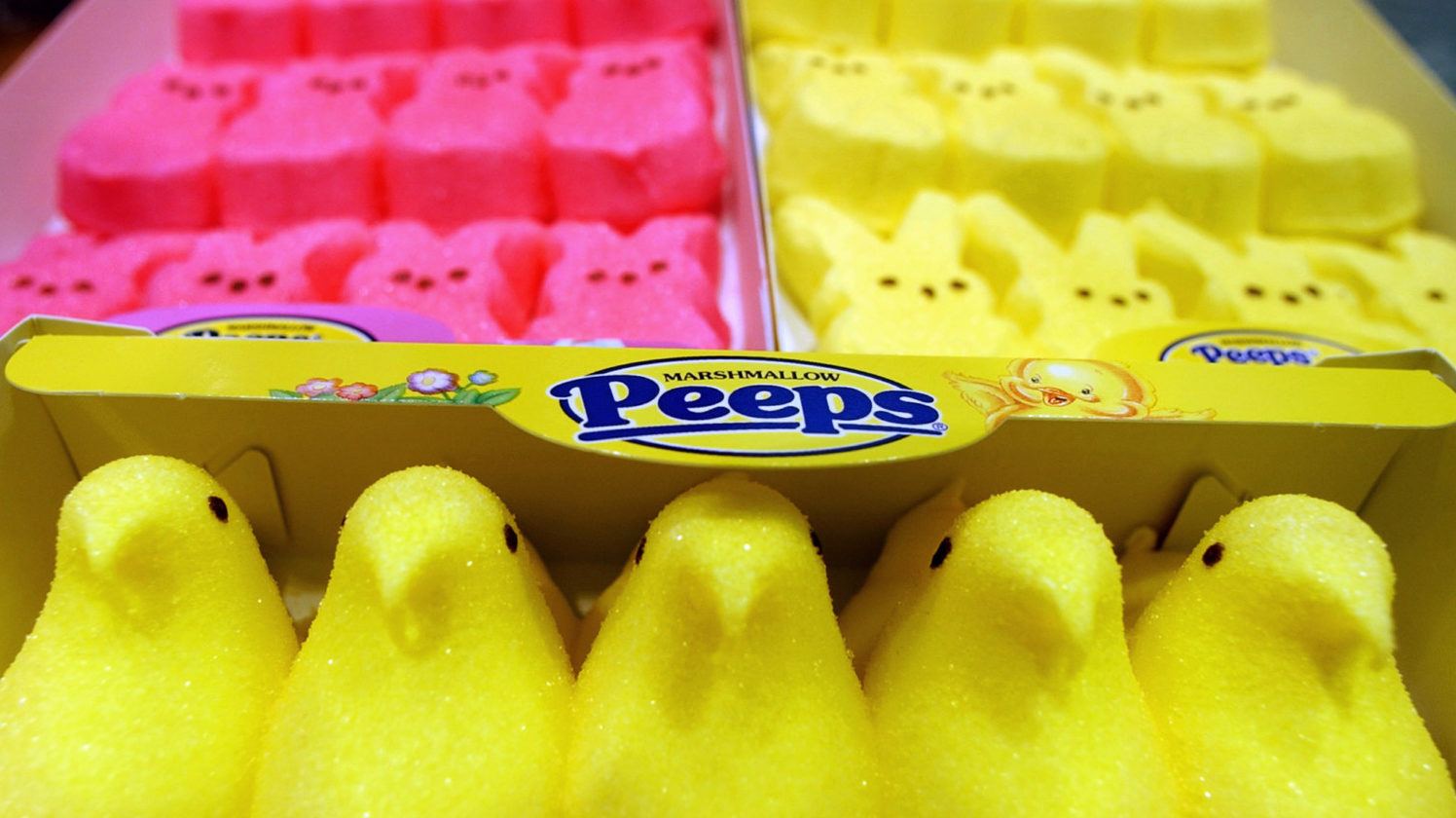 Boxes of Peeps on grocery store shelf.