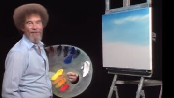 Painter Bob Ross is seen with a canvas and palette