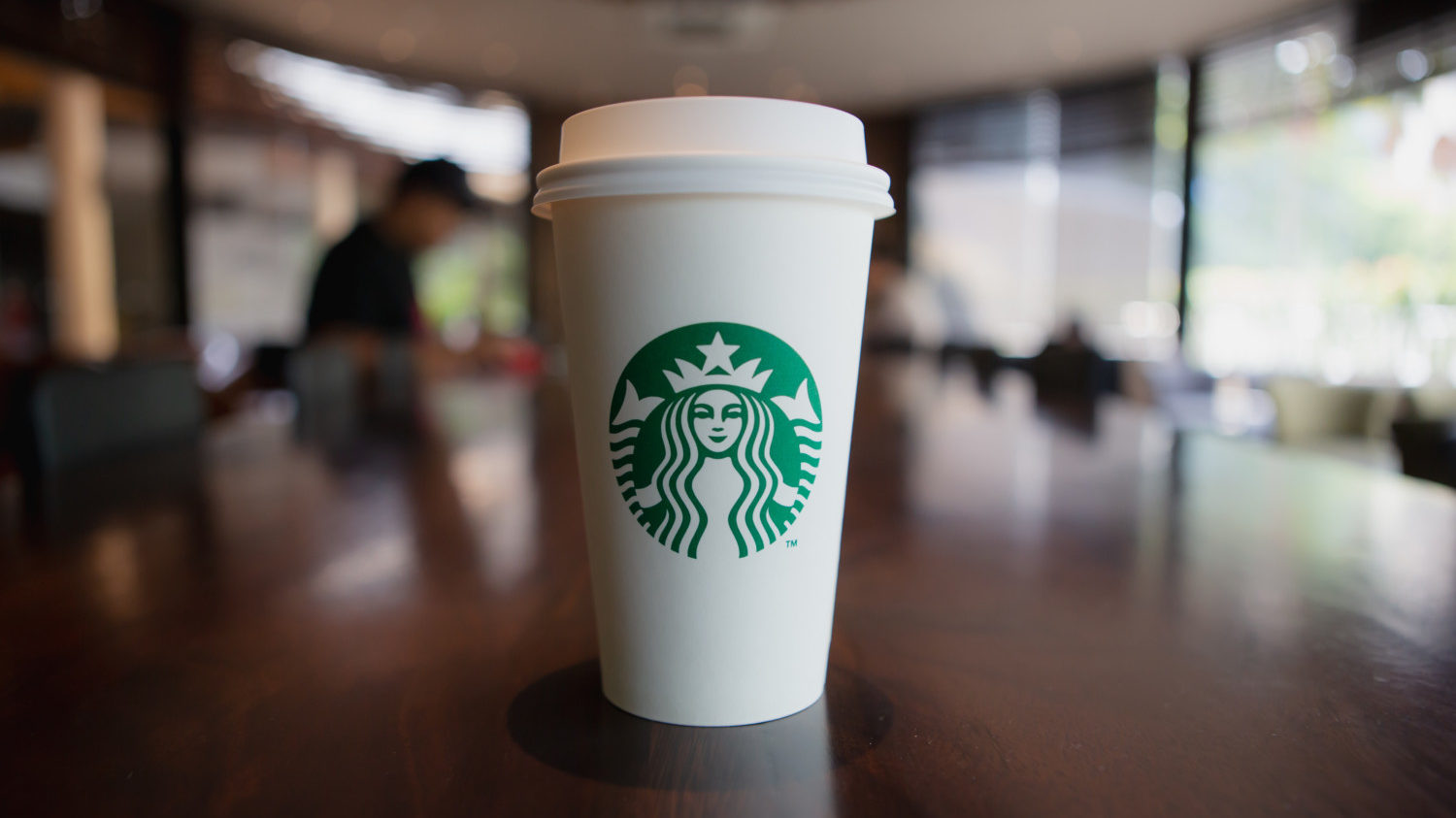 Starbucks disposable cup on table