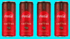 Cans of Mocha Coca-Cola with Coffee are shown on a blue background.
