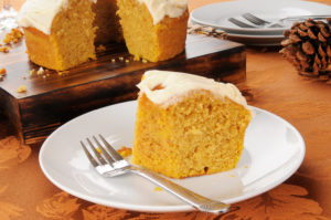 Pumpkin cake on white plate
