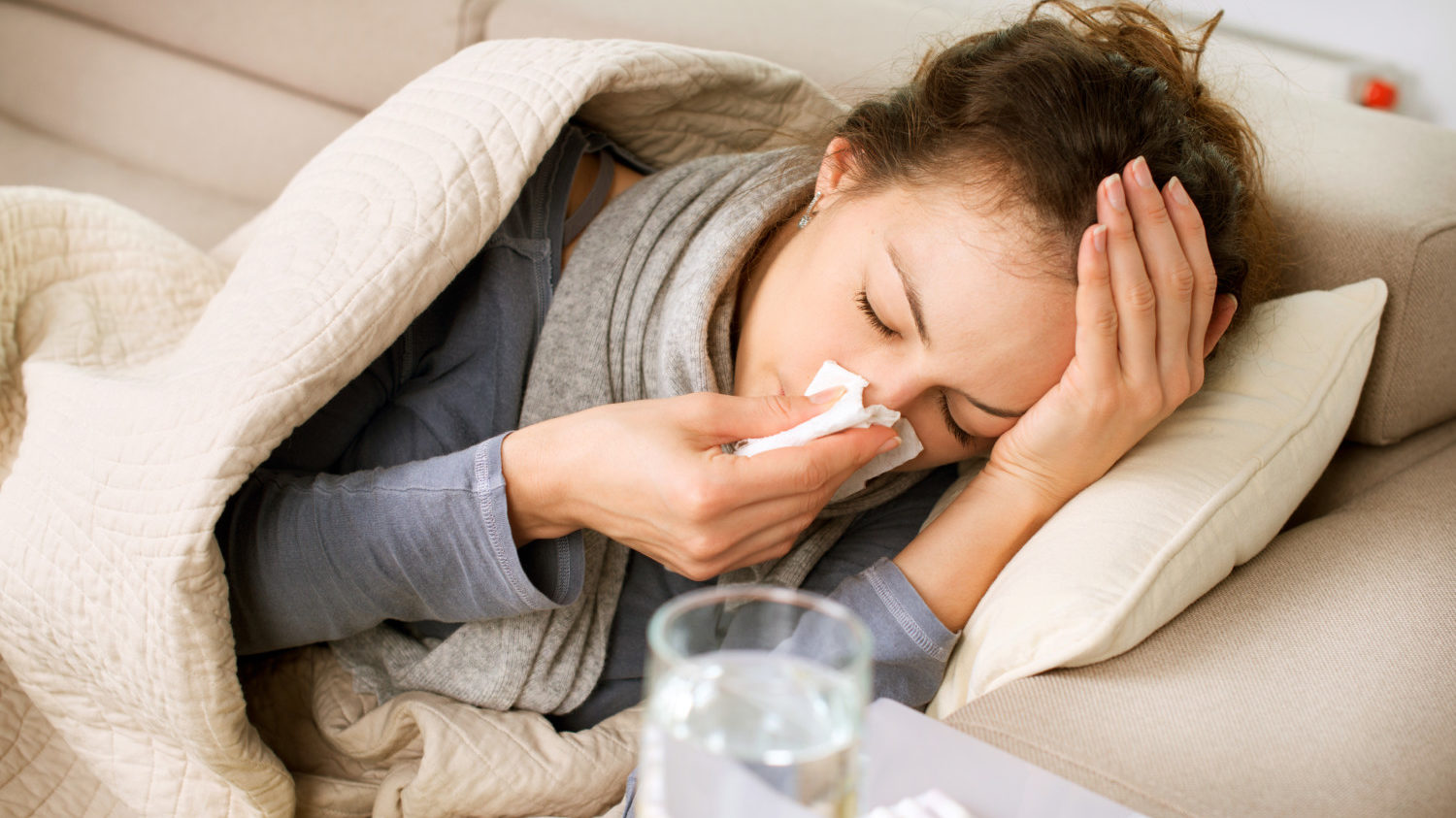 Woman sick with cold or flu