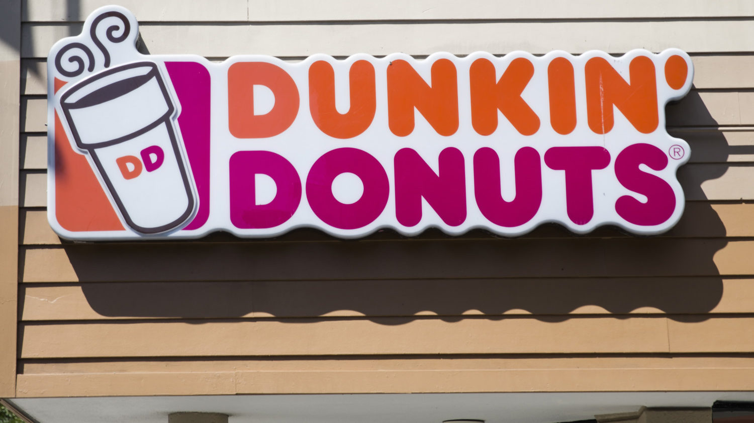 Dunkin Donuts sign on storefront