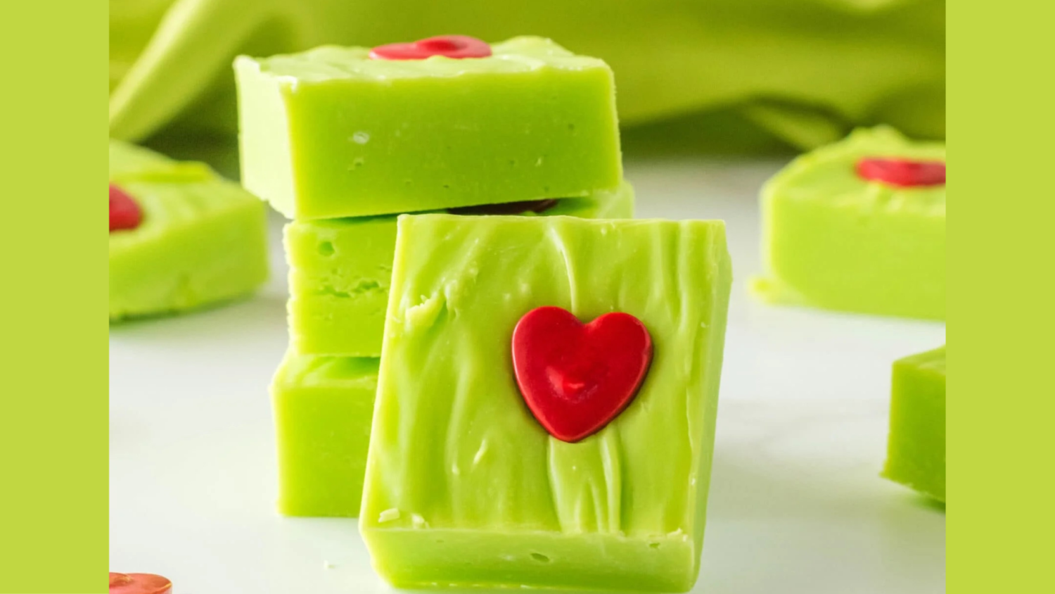Green Grinch fudge with red hearts on each square