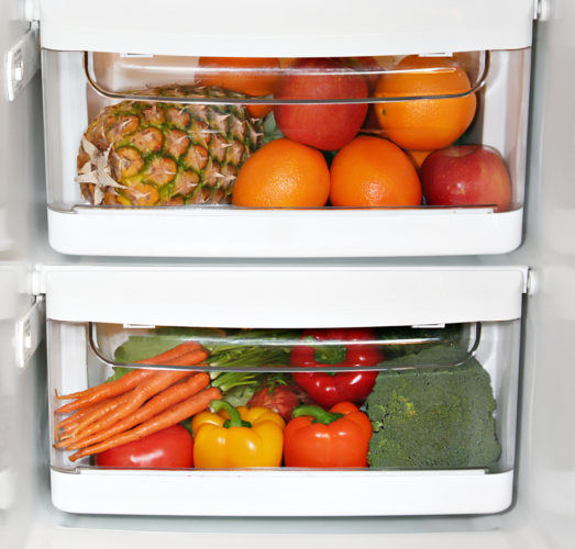 Fruits and vegetables in refrigerator crisper drawer