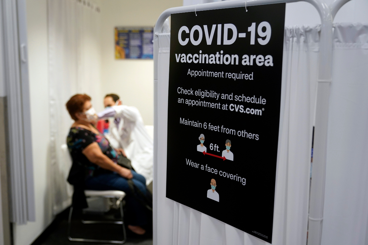Person getting COVID-19 vaccine