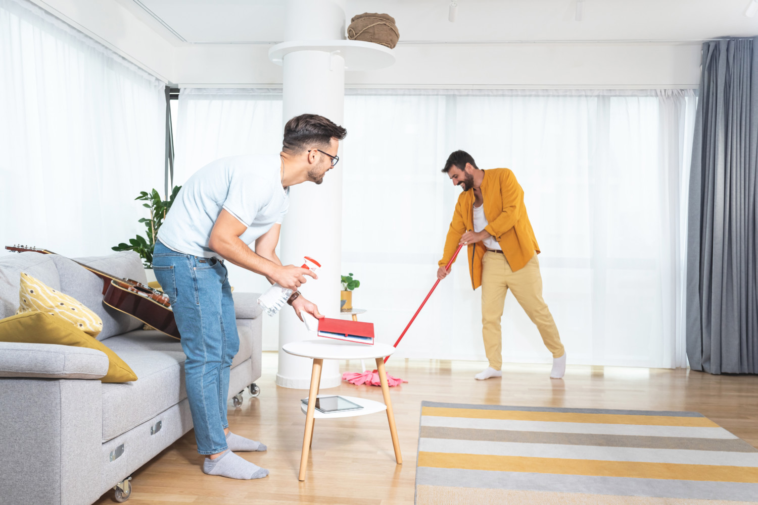 gay couple cleaning