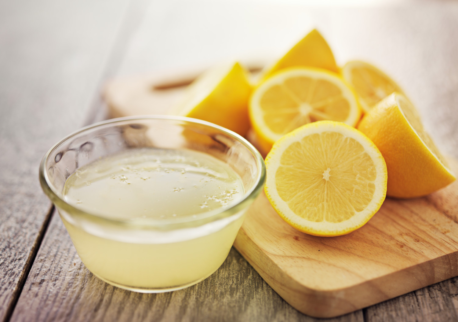 Lemons and freshly squeezed lemon juice