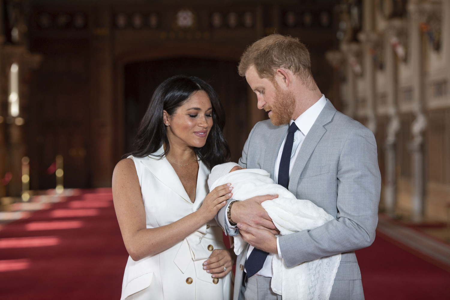Meghan Markle and Prince Harry hold newborn baby Archie
