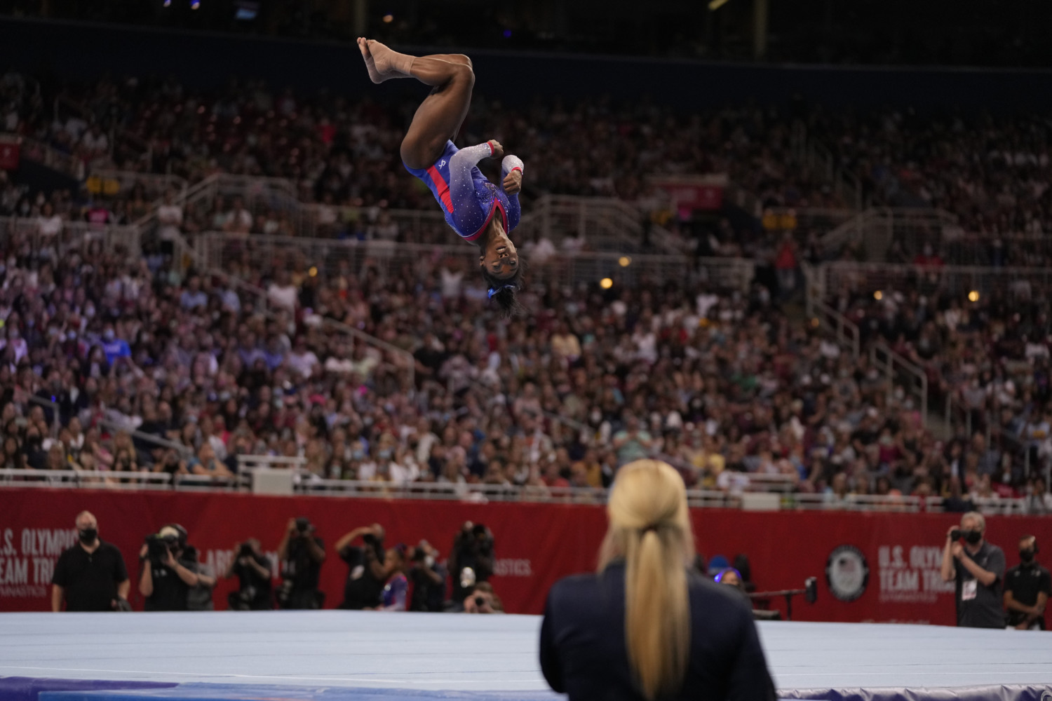 Simone Biles competes in the floor exercise during the women's U.S. Olympic Gymnastics Trials Friday, June 25, 2021, in St. Louis. (AP Photo/Jeff Roberson)