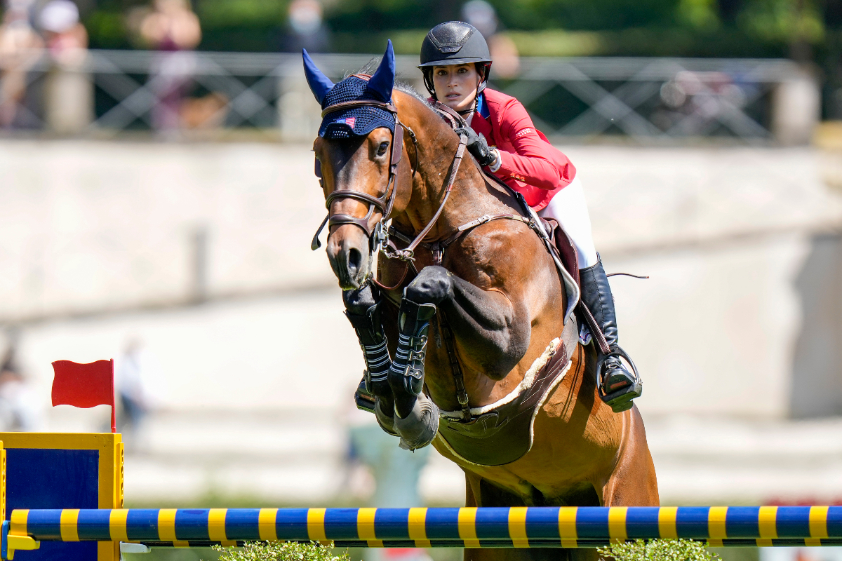 Jessica Springsteen on horse Don Juan Van de Donkhoeve clears jump at competition in Rome