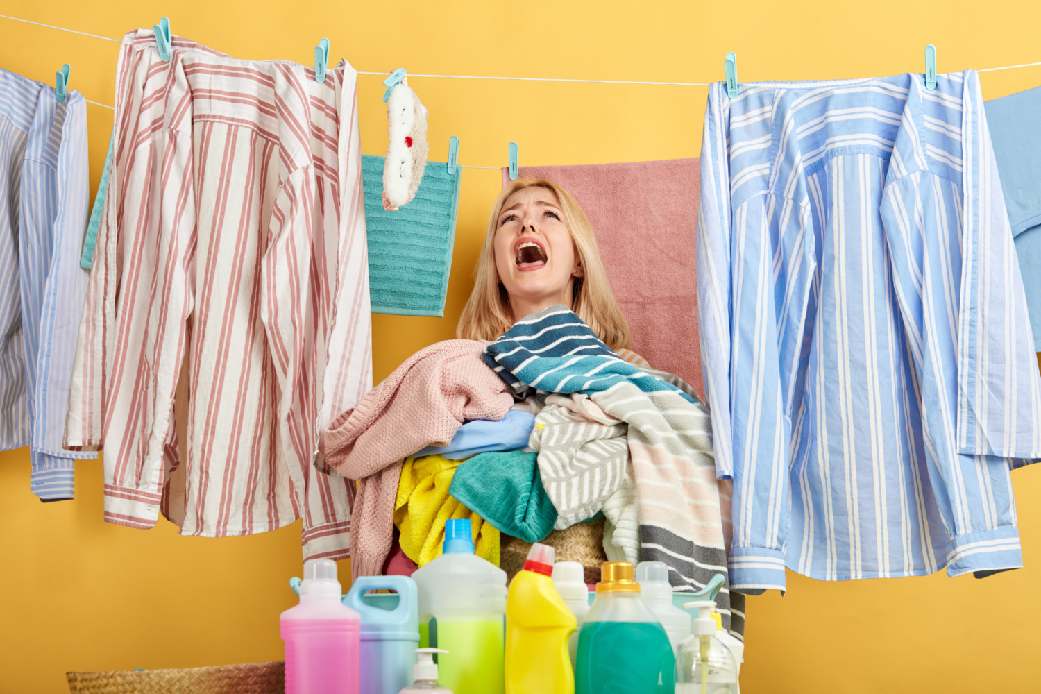 Woman with too much laundry to fold