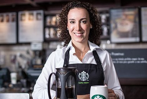 Starbucks black aprons have different meaning than green aprons