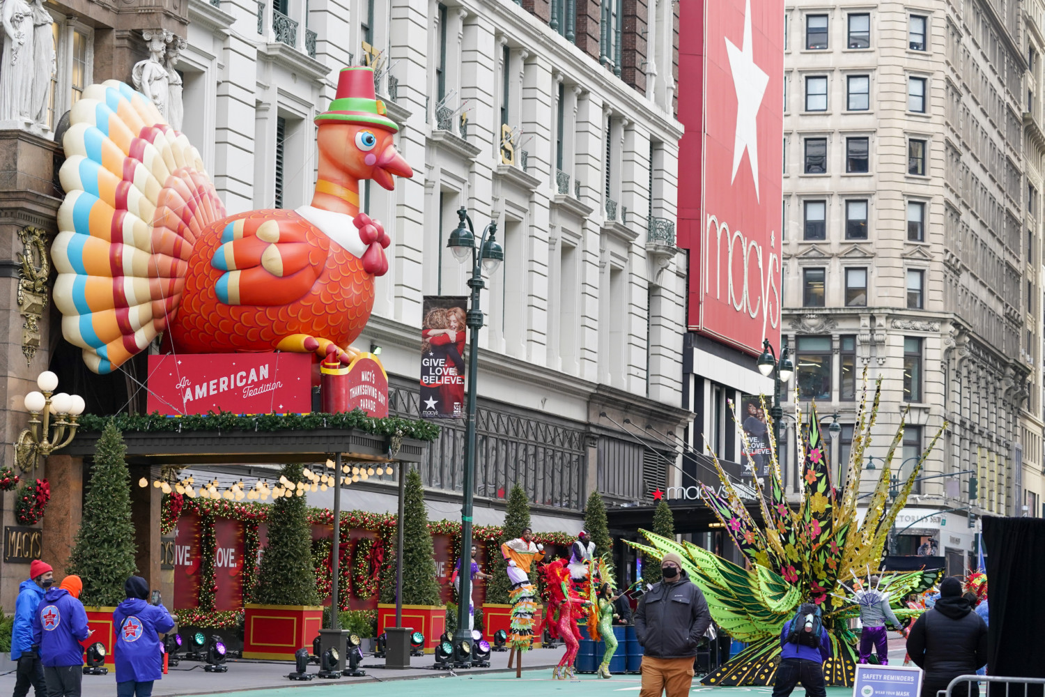 Performers dance along Macy's Thanksgiving Parade route in 2020