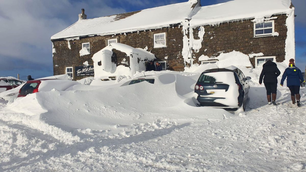 England's Tan Hill Inn is covered in snow as patrons were stranded