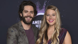 Thomas Rhett, Lauren Akins pose at American Music Awards in 2019
