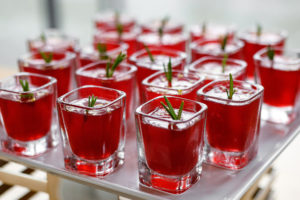 Red jello shots on tray