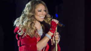 Mariah Carey Christmas song singing in red dress