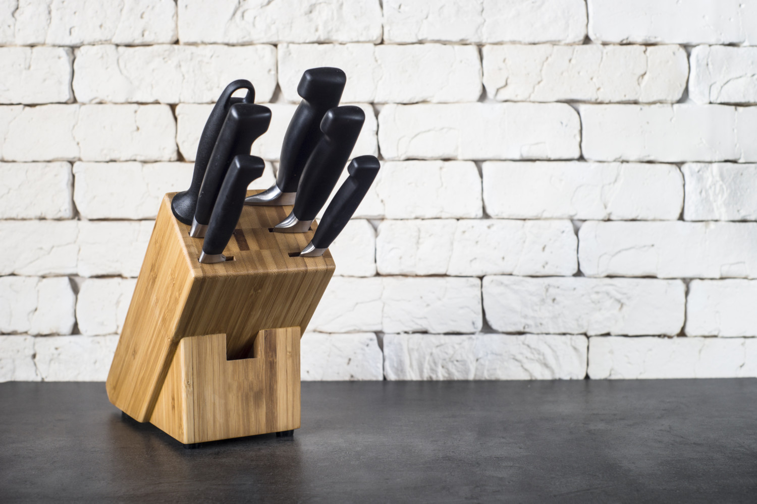 knives in knife block on kitchen counter