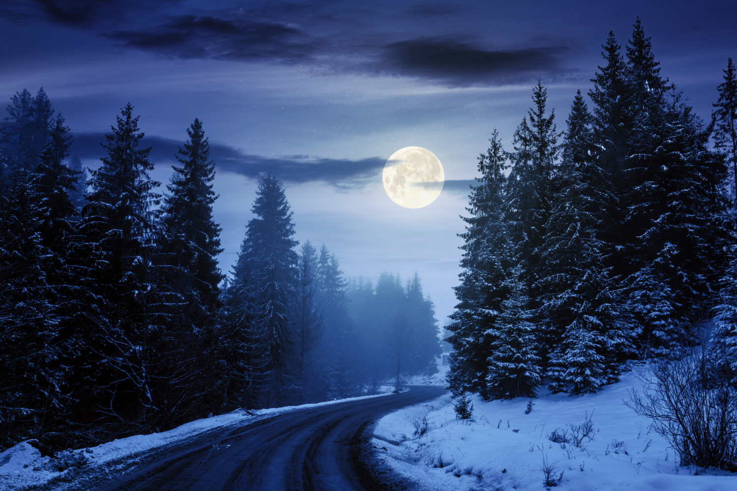 Full cold moon shining brightly at night in winter