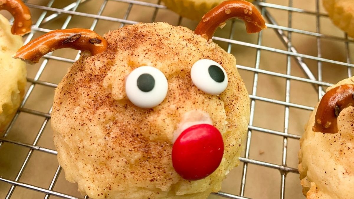 A reindeer muffin is shown on a cooling rack